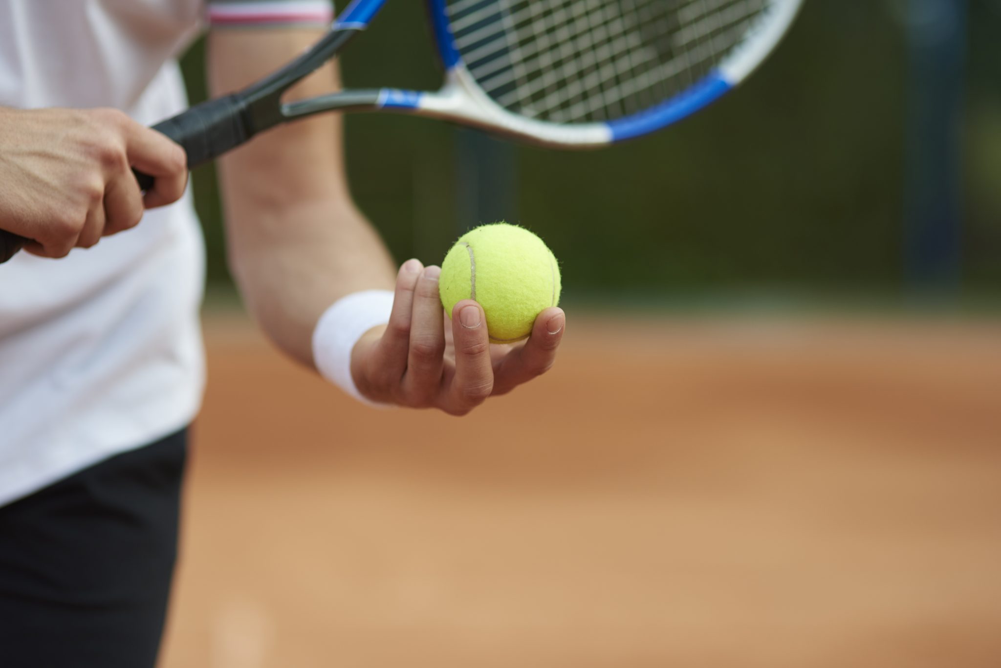 Tennis player is trying to hit the score
