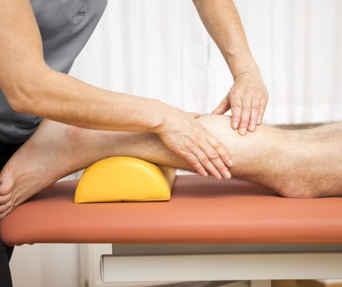 An image of a young man at the physio therapy